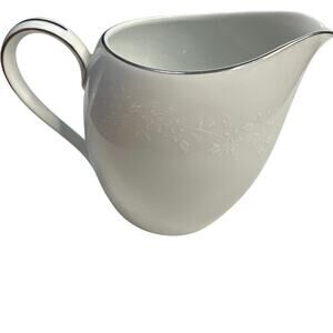 Replacement piece-Creamer  Enchantment Silver trim white flower print  10 oz